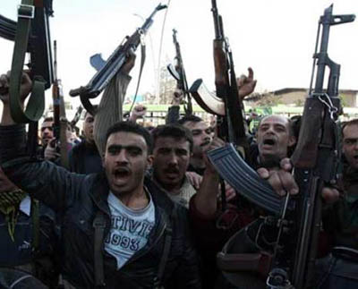 US Report: Syrian Rebels Get More Arms with Gulf Money, US Coordination
